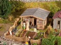 Faller_180493___VOLKSTUIN_MET_GROOT_TUINHUISJE