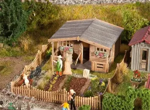 Faller_180493___VOLKSTUIN_MET_GROOT_TUINHUISJE_1